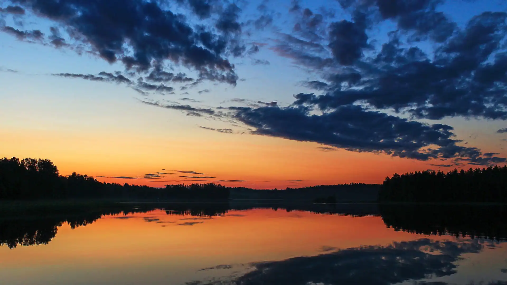 Sunset reflecting on a calm lake near Brown County, Indiana